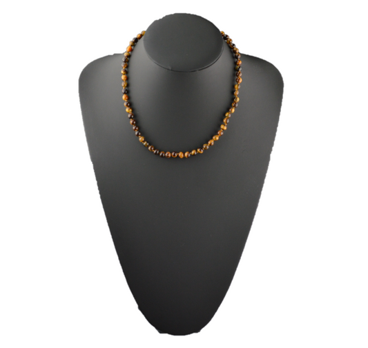 "Protect yourself and achieve your goals with this unique tiger eye necklace"